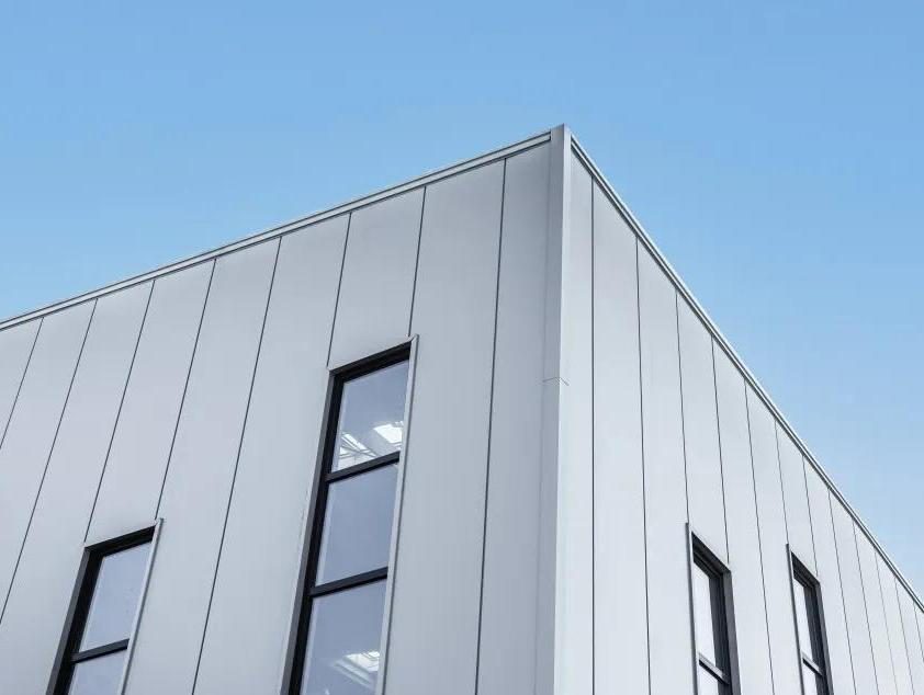 Grey architectural wall panels with hidden fasteners
